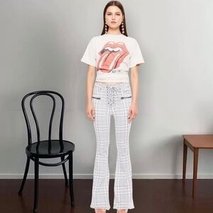 Plaid Grey High waisted and bell bottom jeans .